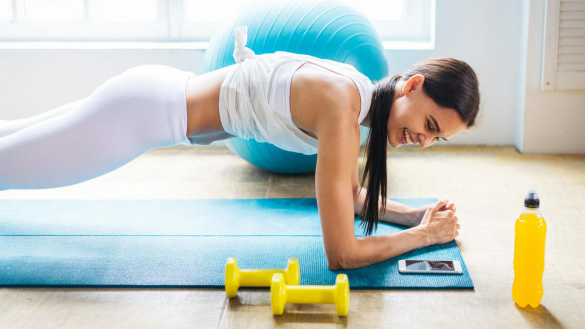 sportive woman training at home